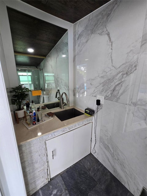 Tiny photo for 2340 NE 8th Avenue, Pompano Beach, FL 33064 (MLS # B26089958)
