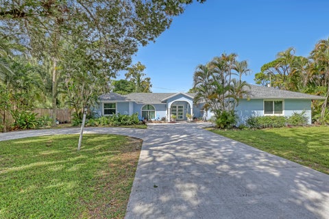 Photo of 799 Huff Road, Haverhill, FL 33415 (MLS # B26089929)