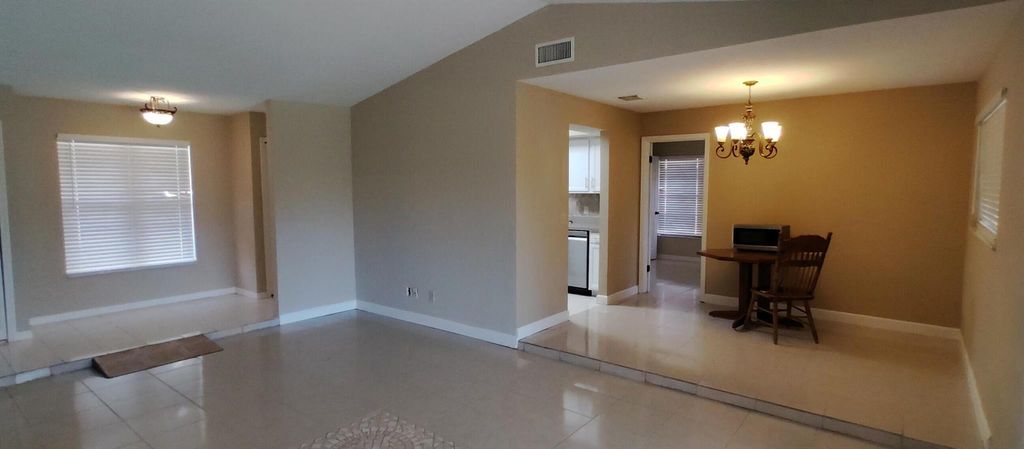 Photo of 449 NW Marion Avenue, Port Saint Lucie, FL 34983 (MLS # R11079951)