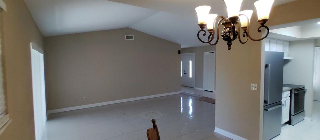 Photo of 449 NW Marion Avenue, Port Saint Lucie, FL 34983 (MLS # R11079951)