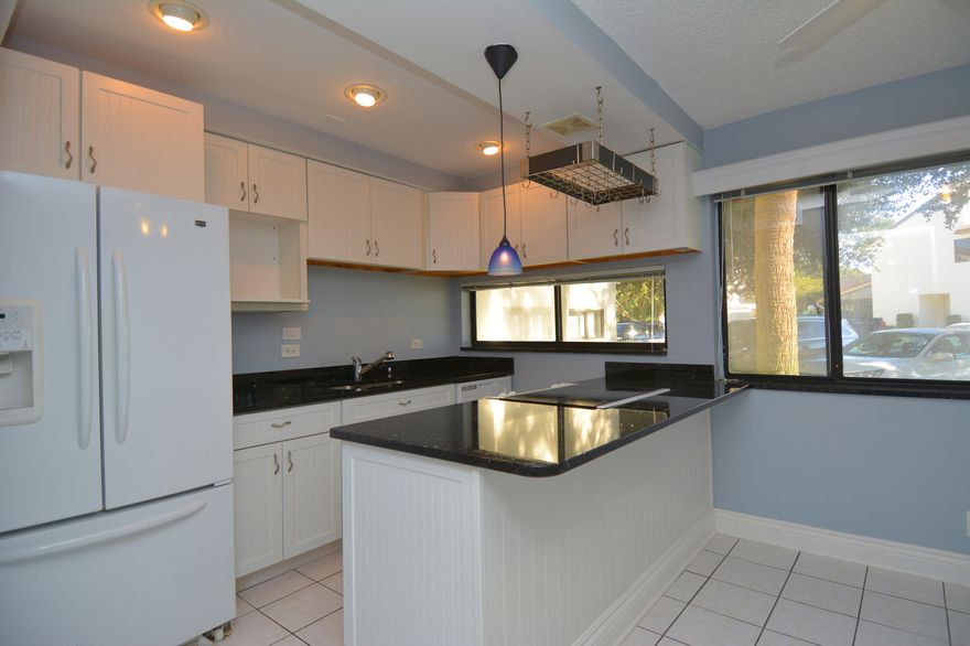 Location, Location Location! Waterfront townhouse in Poppleton Creek within walking distance to downtown Stuart. PRIVATE DOCK owned by this unit with one fixed bridge to wide water access. This townhouse offers two master suites upstairs each with bathroom and plenty of closets and storage. Half bath downstairs with full size stackable washer and dryer. Updated kitchen with granite counter tops. Community has two swimming pools with clubhouse, not age restricted, is pet friendly, motorcycles and trucks allowed. Lease OK w/restrictions. Low HOA fee includes: External insurance, water, sewer, basic cable, lawn care, pool and clubhouse.