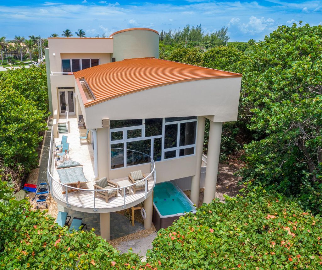 Photo of 10330 S Ocean Drive, Fort Pierce, FL 34949 (MLS # R11166085)