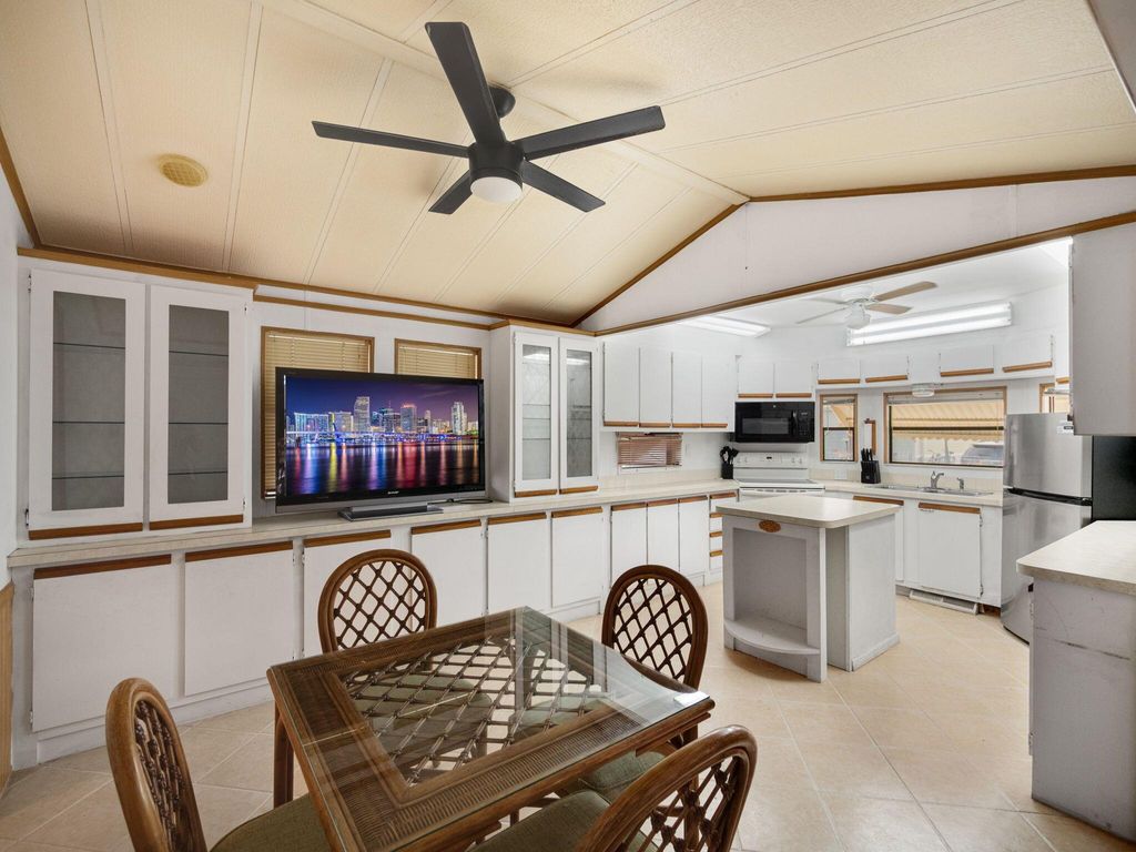 Photo of 556 Nettles Boulevard, Jensen Beach, FL 34957 (MLS # R11098643)