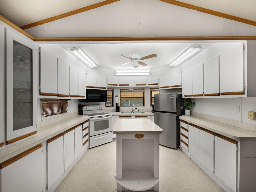 Photo of 556 Nettles Boulevard, Jensen Beach, FL 34957 (MLS # R11098643)