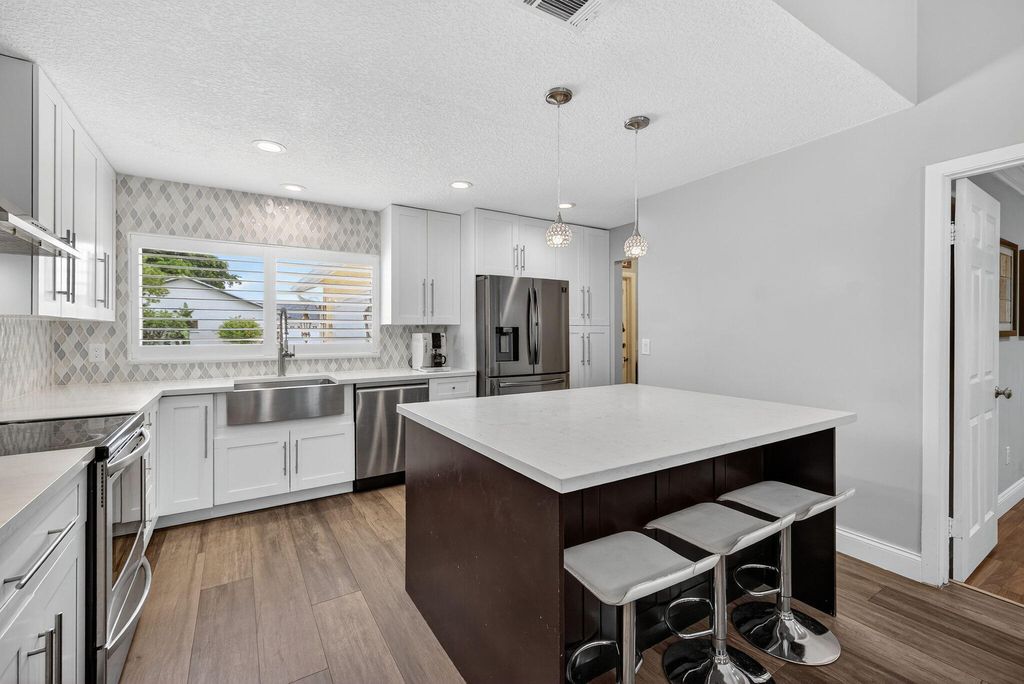 Photo of 9820 Orange Park Trail, Boca Raton, FL 33428 (MLS # R11121425)