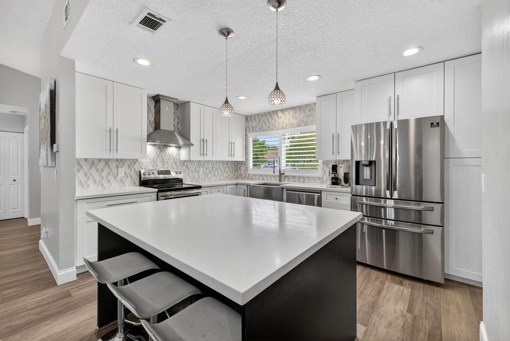 Photo of 9820 Orange Park Trail, Boca Raton, FL 33428 (MLS # R11121425)