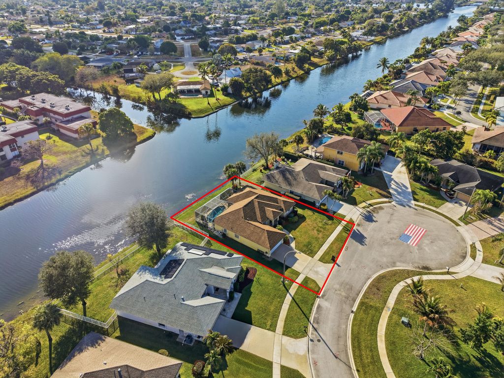 Photo of 106 Locust Lane, West Palm Beach, FL 33411 (MLS # R11165043)