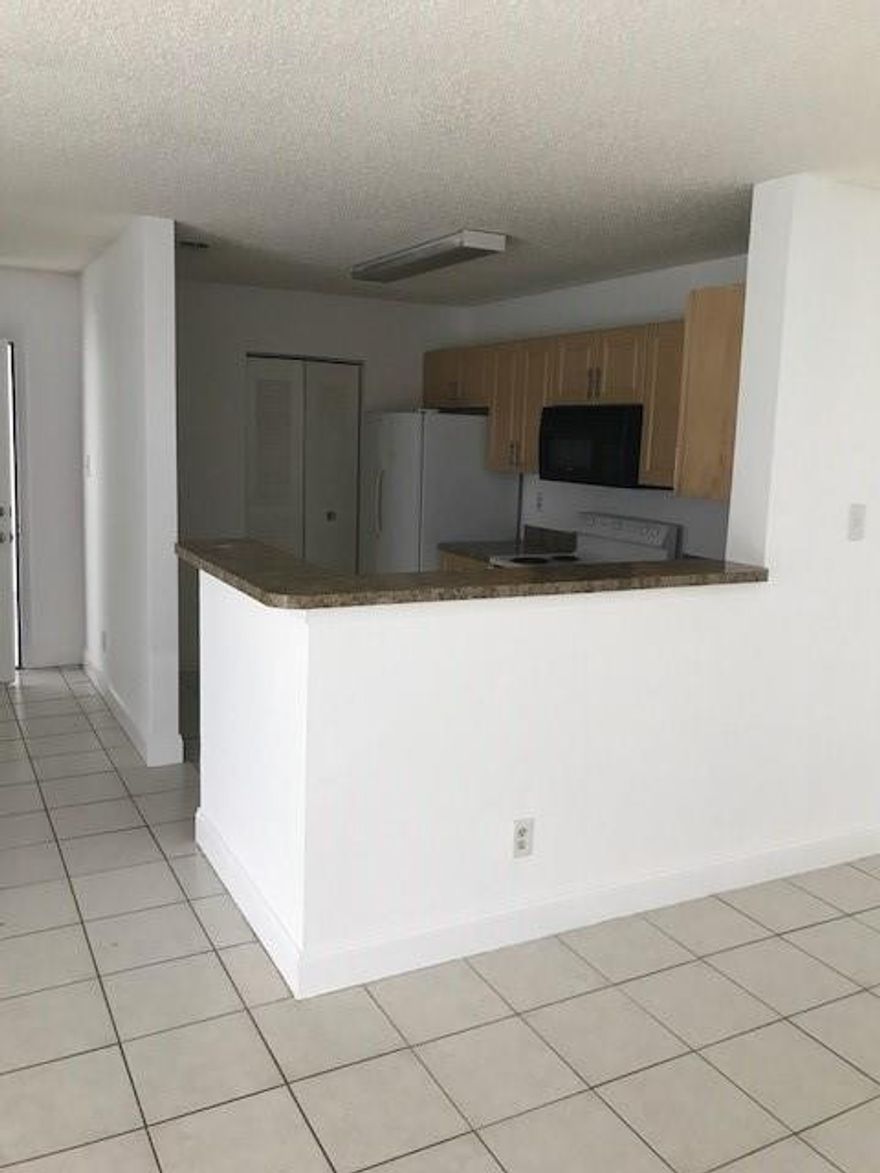 Calling Investors! 2 bed 2 bath located in the gated Atlantic Springs community. Can lease 1st year of ownership. Split floor plan. Tennis courts, gym and community clubhouse. Mins to the Sawgrass Expwy , Supermarkets, Restaurants and shopping areas.