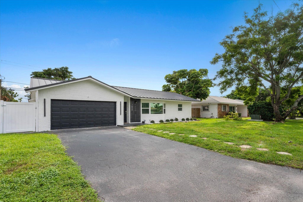 Photo of 1650 NW 9TH Street, Boca Raton, FL 33486 (MLS # B26077215)