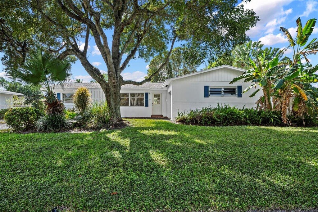 Photo of 516 Sabal Palm Drive, Lake Park, FL 33403 (MLS # R11158174)