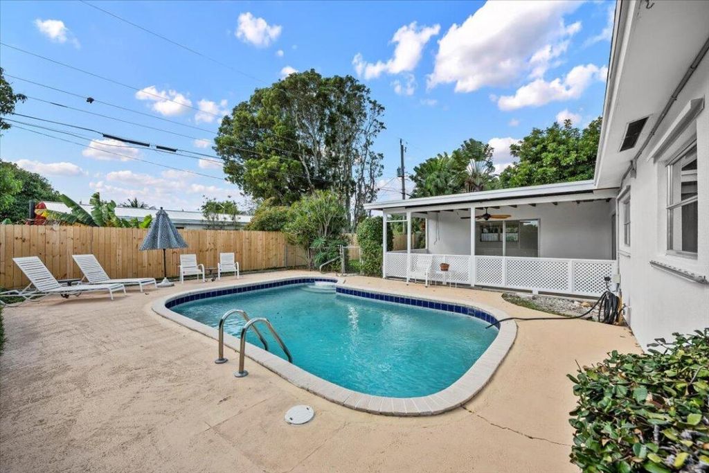 Photo of 516 Sabal Palm Drive, Lake Park, FL 33403 (MLS # R11158174)