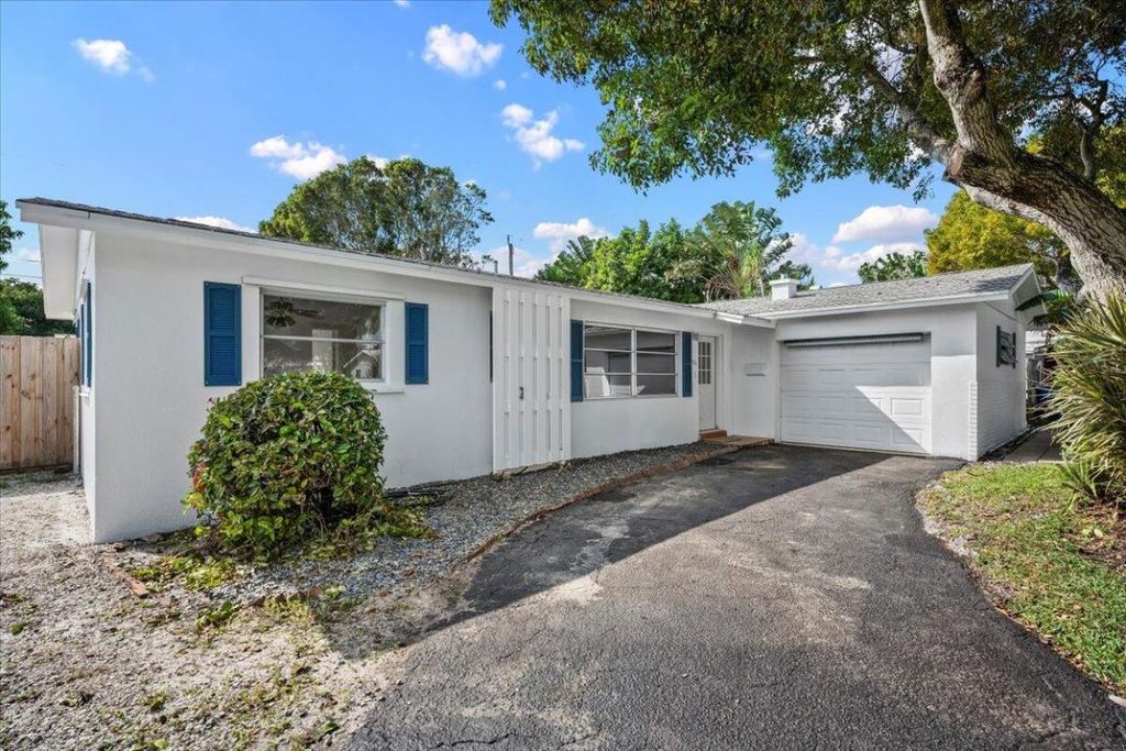 Photo of 516 Sabal Palm Drive, Lake Park, FL 33403 (MLS # R11158174)