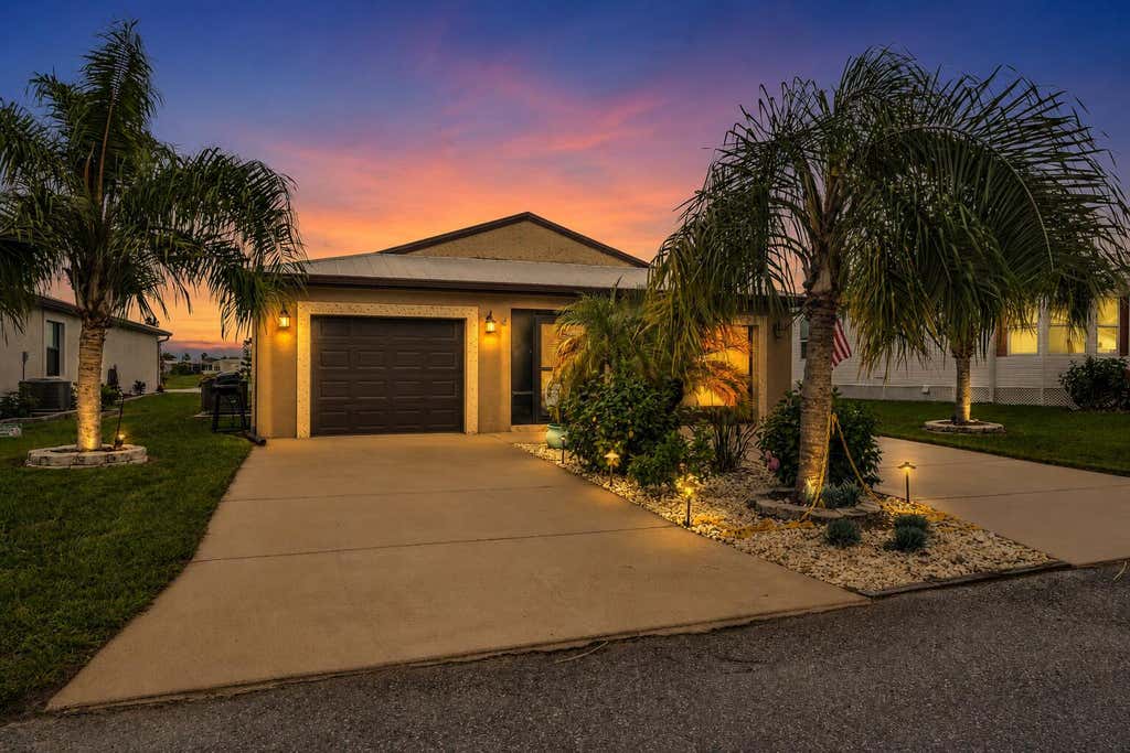 Photo of 14961 Aguila Ave, Fort Pierce, FL 34951 (MLS # B26027970)