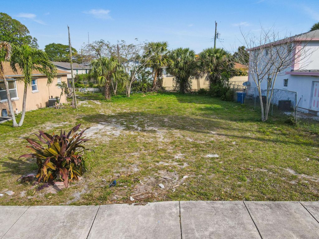 Photo of 1204 W 35th Street, Riviera Beach, FL 33404 (MLS # R10960690)