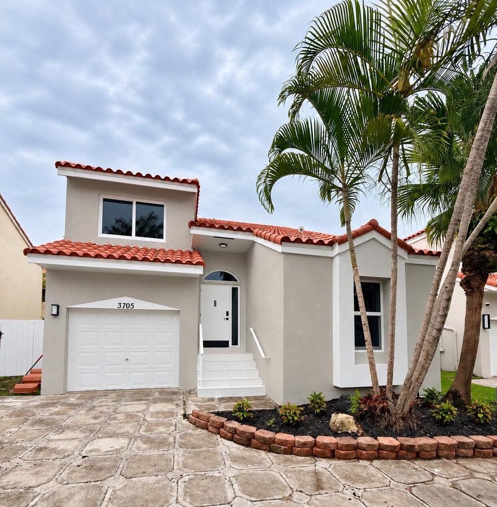 Photo of 3705 VALAIS Drive, Hollywood, FL 33021 (MLS # B26082457)