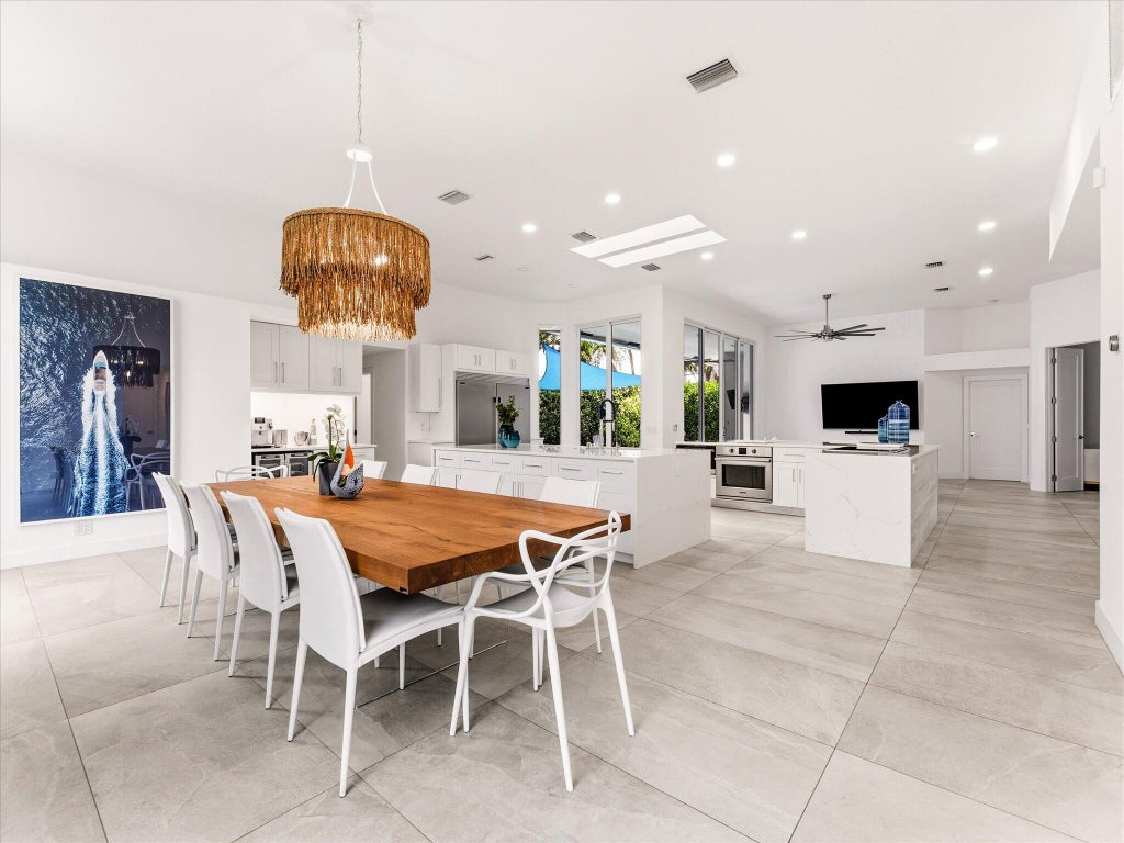 Photo of 1002 Lake Shore Drive, Delray Beach, FL 33444 (MLS # B26042318)