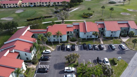 Photo of 5403 SE Miles Grant Road #H108, Stuart, FL 34997 (MLS # B26057984)