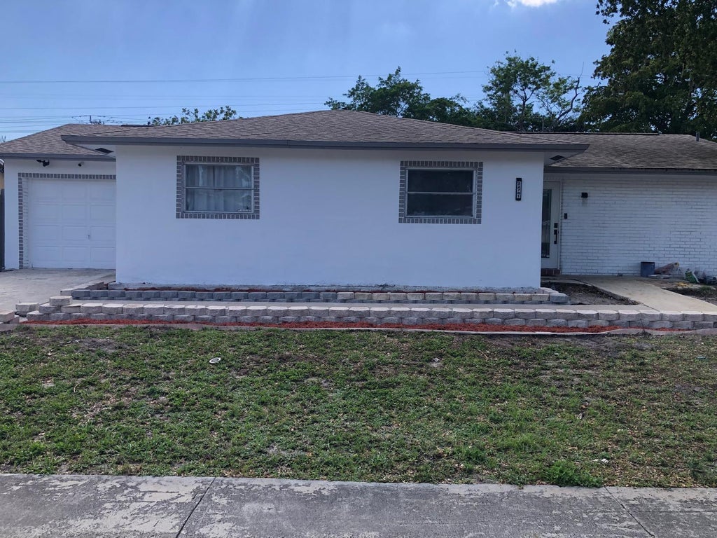 Photo of 22761 Tradewind Road, Boca Raton, FL 33428 (MLS # B26077355)