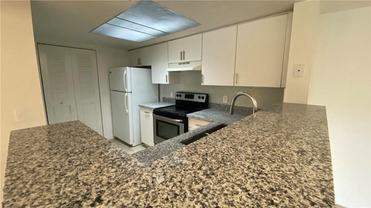 Premier Location in Coconut Creek. Excellent school district. Over 1200 Sq Ft, Spacious 2/2 in a gated community. Kitchen recently remodeled, Tile thru-out, Washer/Dryer. Water included. Community offers excellent amenities, clubhouse, gym, tennis courts, pool. Walking distance to Promenade offering entertainment, shops and restaurants. 640 Minimum Credit Score Required
