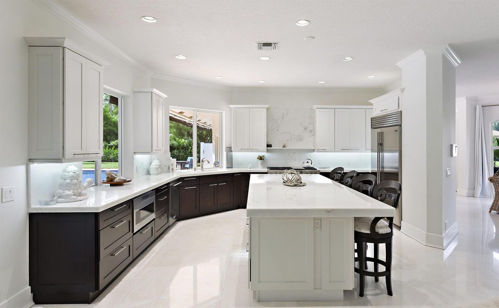 Photo of 7550 NW 49th Lane, Coconut Creek, FL 33073 (MLS # R10927635)