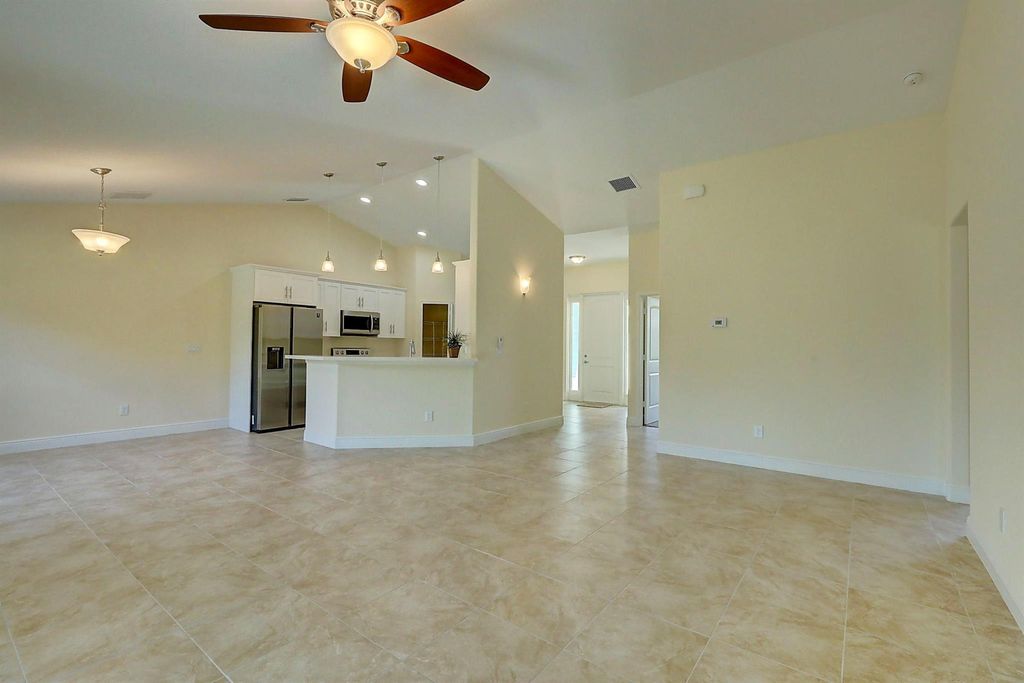 Photo of 1858 SW Whipple Avenue, Port Saint Lucie, FL 34953 (MLS # R11047914)