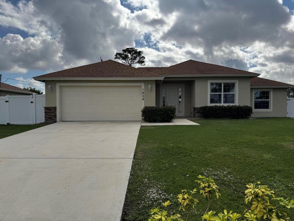 Photo of 1858 SW Whipple Avenue, Port Saint Lucie, FL 34953 (MLS # R11047914)
