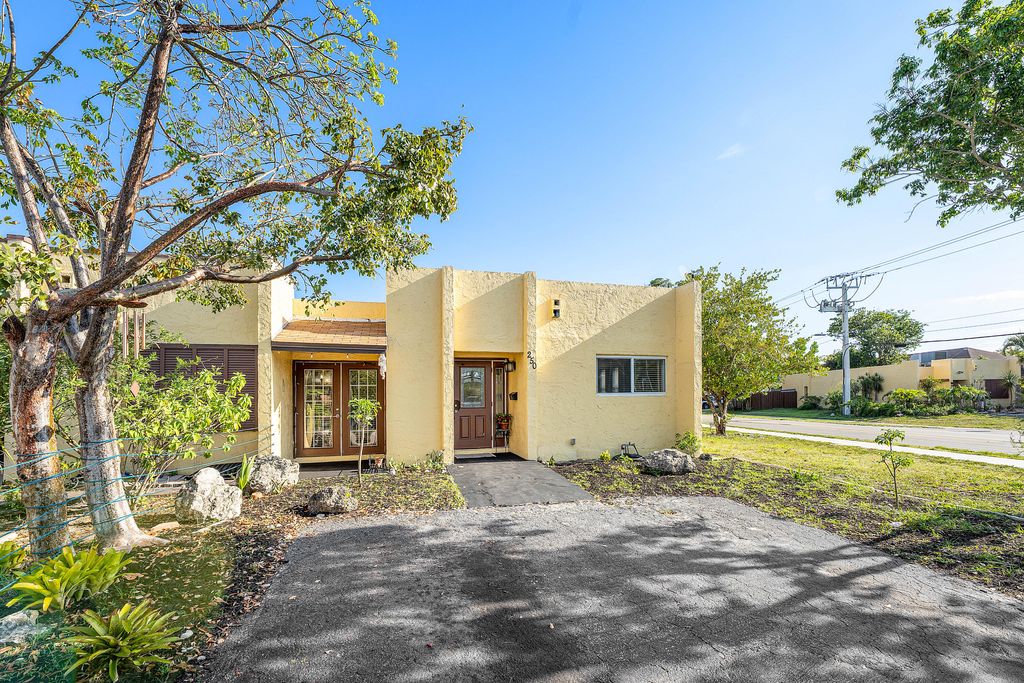 Photo of 250 NW 43rd Place, Pompano Beach, FL 33064 (MLS # B26024164)