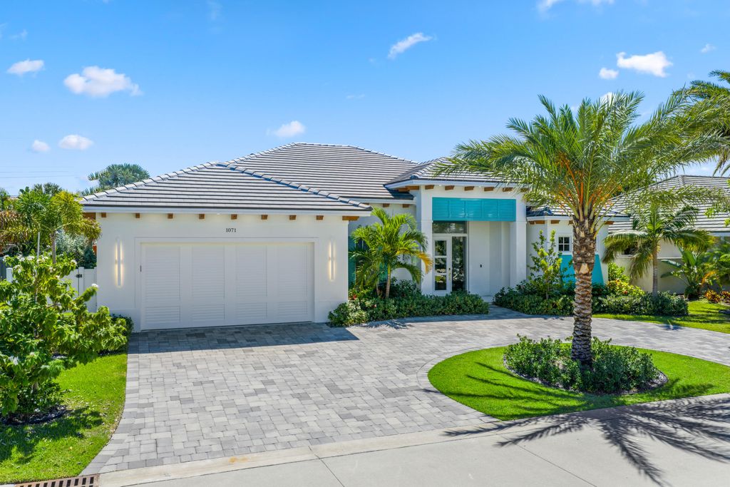 Photo of 1071 Powell Drive, Singer Island, FL 33404 (MLS # R11063680)