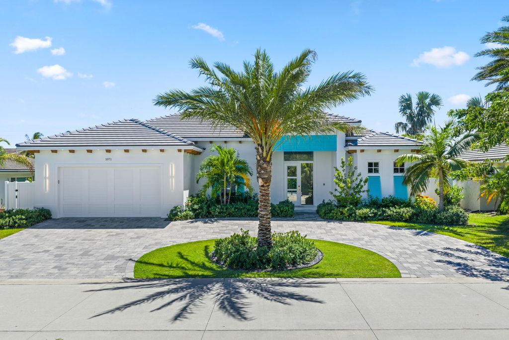 Photo of 1071 Powell Drive, Singer Island, FL 33404 (MLS # R11063680)