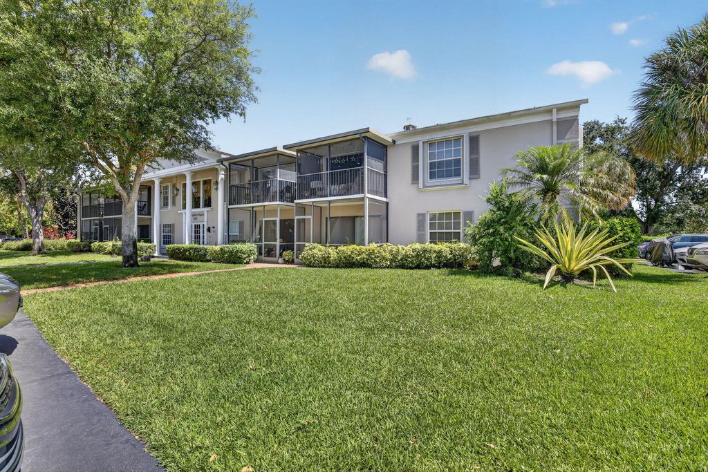 Photo of 9101 Jacaranda Lane #107, Plantation, FL 33324 (MLS # B26023389)