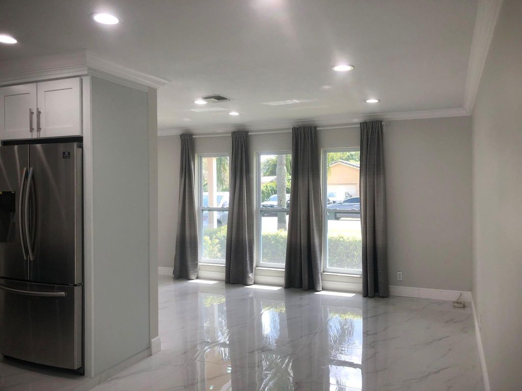 Photo of 3980 NW 109th Avenue, Coral Springs, FL 33065 (MLS # F10541152)
