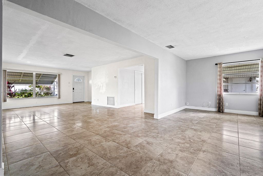 Photo of 111 NW 31st Street, Pompano Beach, FL 33064 (MLS # B26005077)