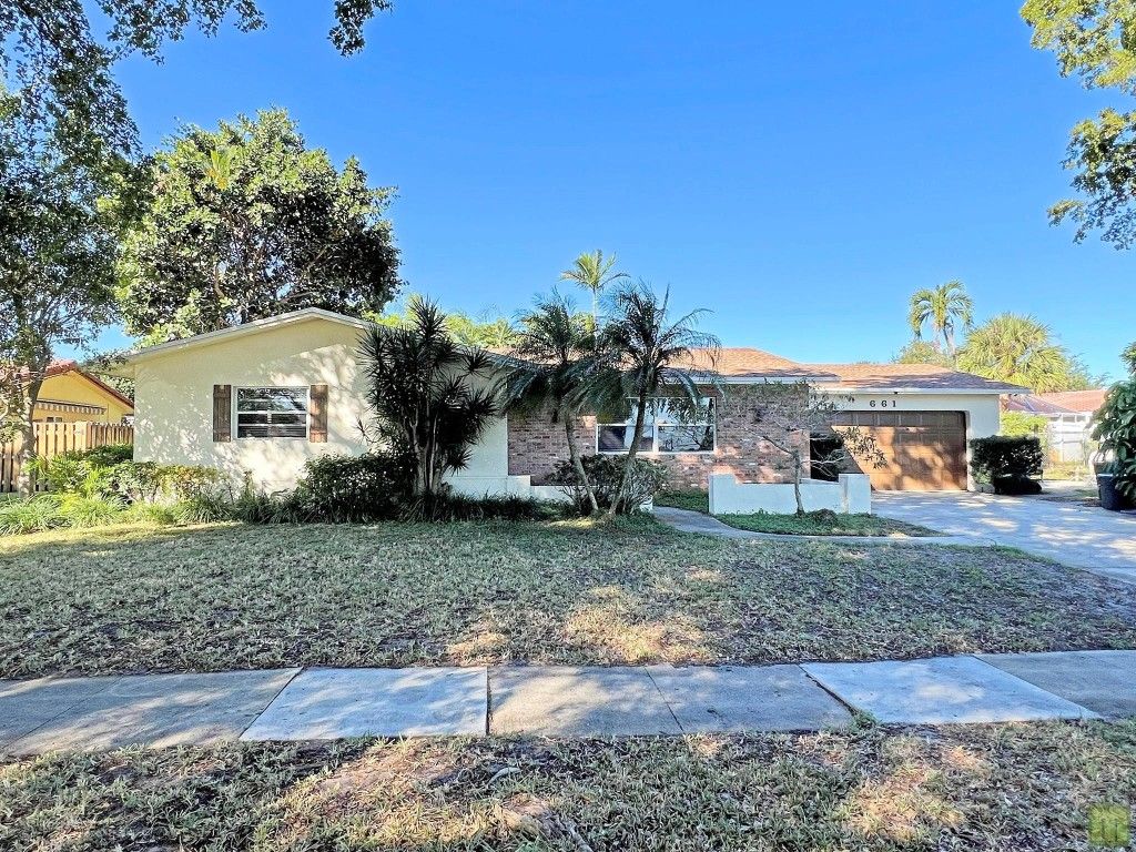 Photo of 661 Palmetto Drive, Coconut Creek, FL 33066 (MLS # F10541198)