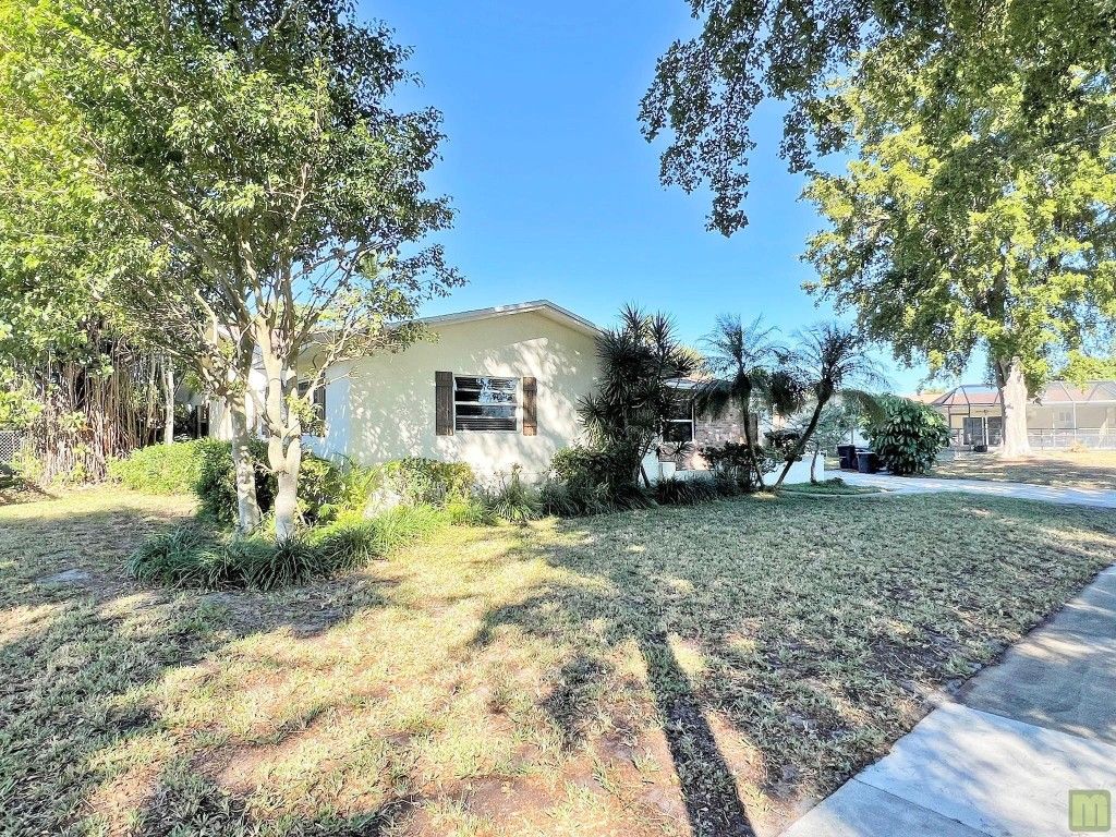 Photo of 661 Palmetto Drive, Coconut Creek, FL 33066 (MLS # F10541198)