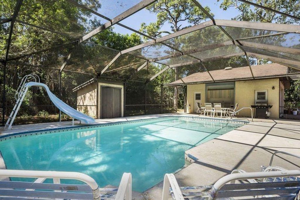 Photo of 895 N Woodlands Drive, Port Saint Lucie, FL 34952 (MLS # F10448088)