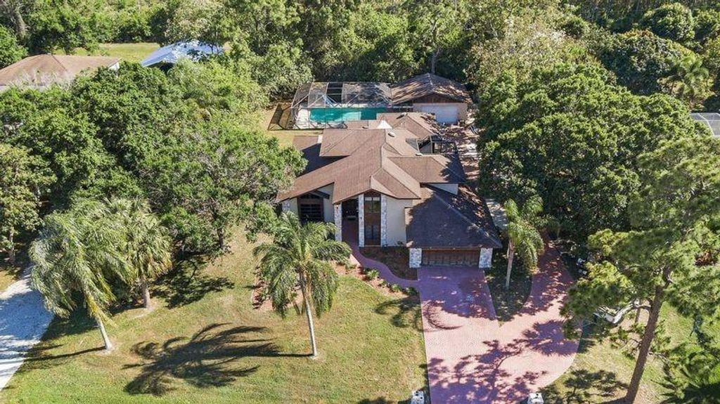 Photo of 895 N Woodlands Drive, Port Saint Lucie, FL 34952 (MLS # F10448088)