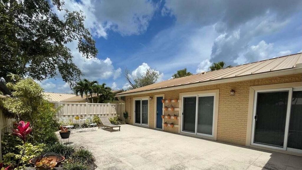 Photo of 5992 Golden Eagle Circle, Palm Beach Gardens, FL 33418 (MLS # R10892214)