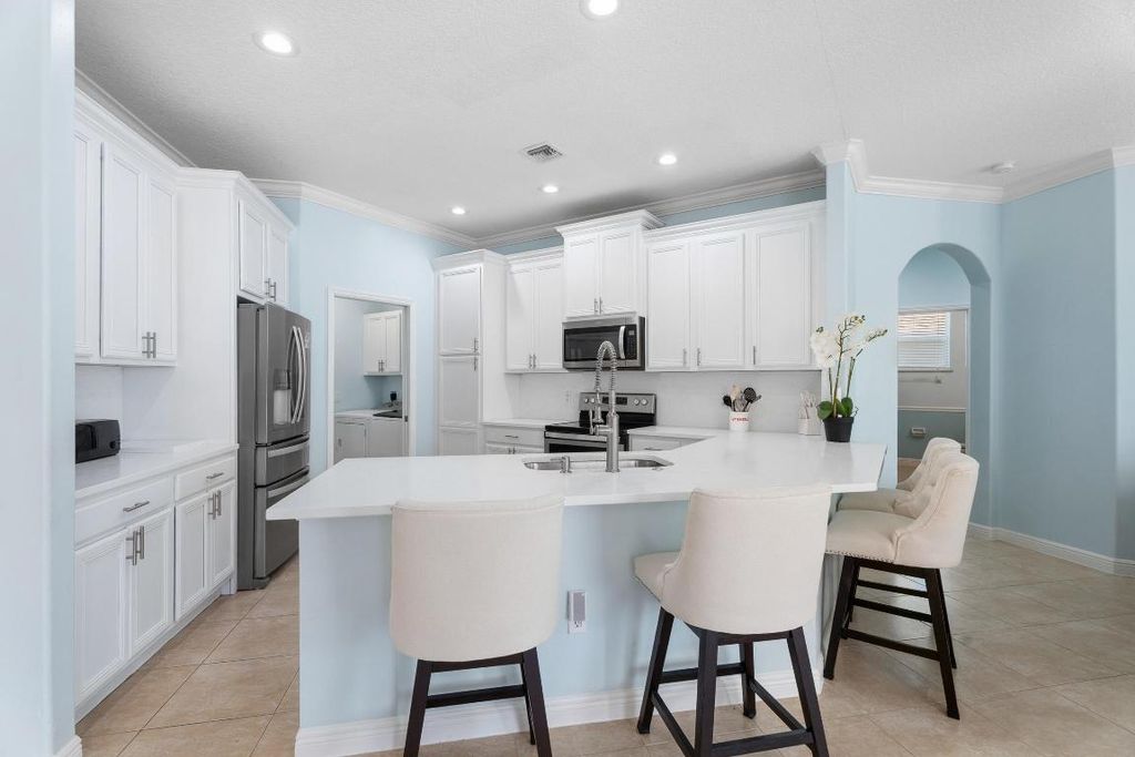 Photo of 5806 NW Rose Petal Court, Port Saint Lucie, FL 34986 (MLS # R11156211)