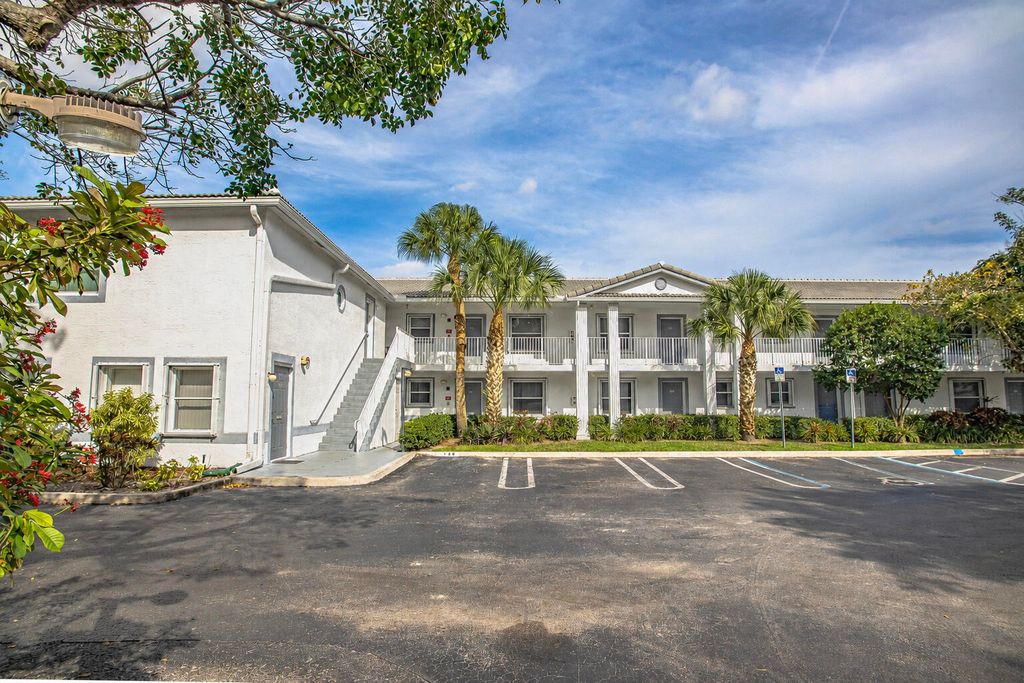 Photo of 9013 NW 38th Drive #106, Coral Springs, FL 33065 (MLS # B26033482)