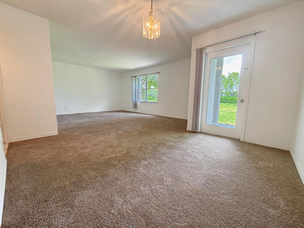 Photo of 9013 NW 38th Drive #106, Coral Springs, FL 33065 (MLS # B26033482)