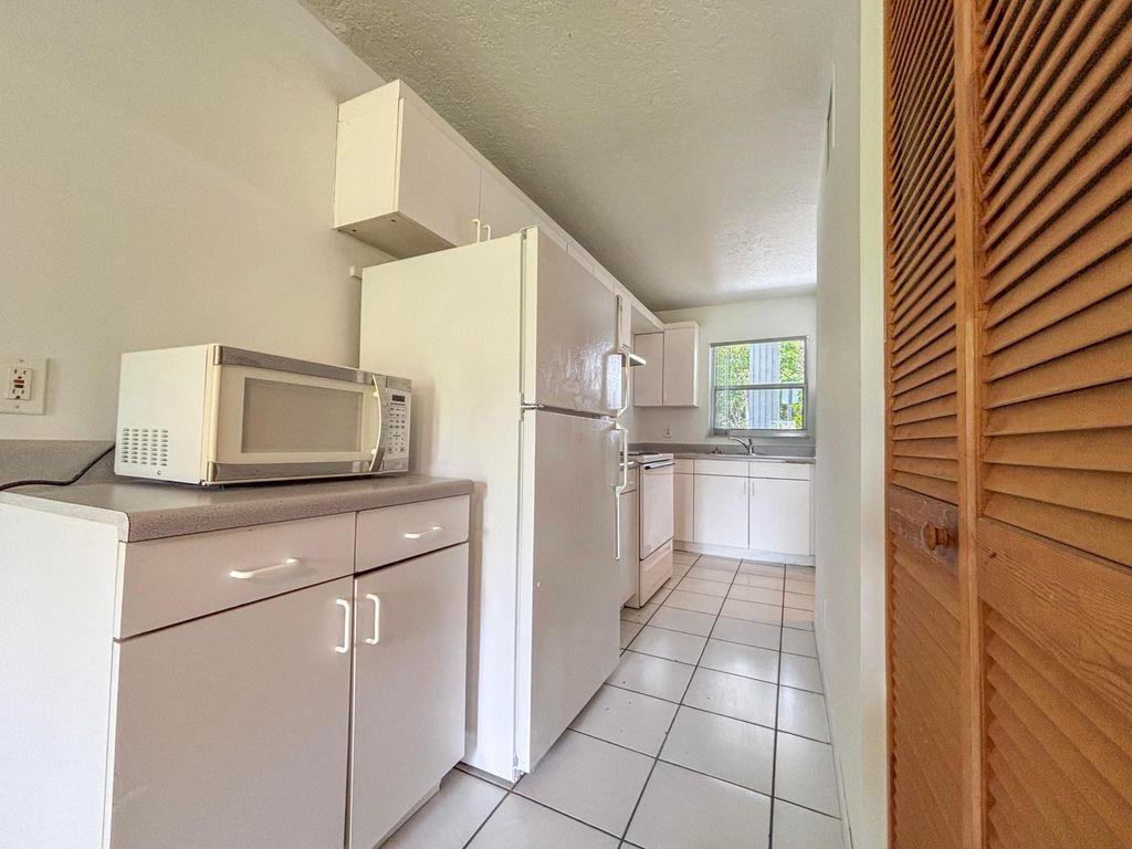 Photo of 9013 NW 38th Drive #106, Coral Springs, FL 33065 (MLS # B26033482)