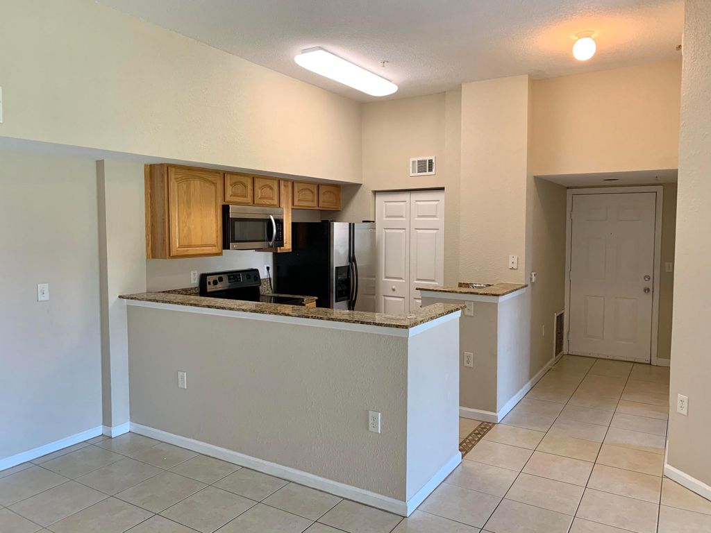 Photo of 231 SW Palm Drive #303, Port Saint Lucie, FL 34986 (MLS # B26019360)