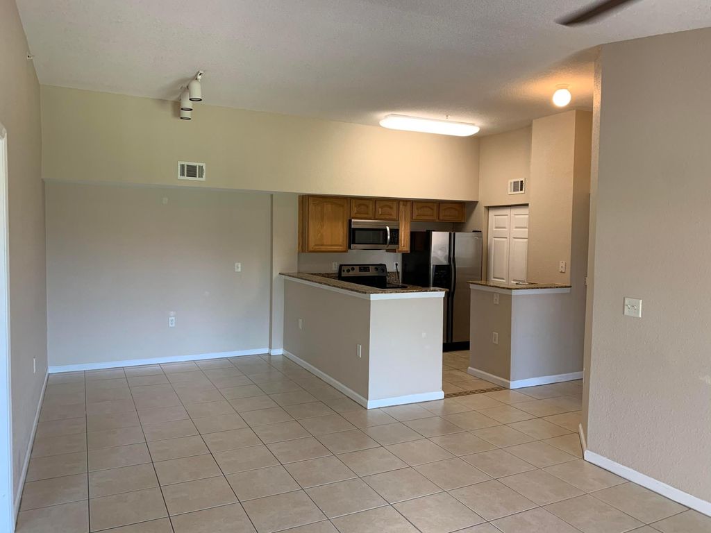 Photo of 231 SW Palm Drive #303, Port Saint Lucie, FL 34986 (MLS # B26019360)