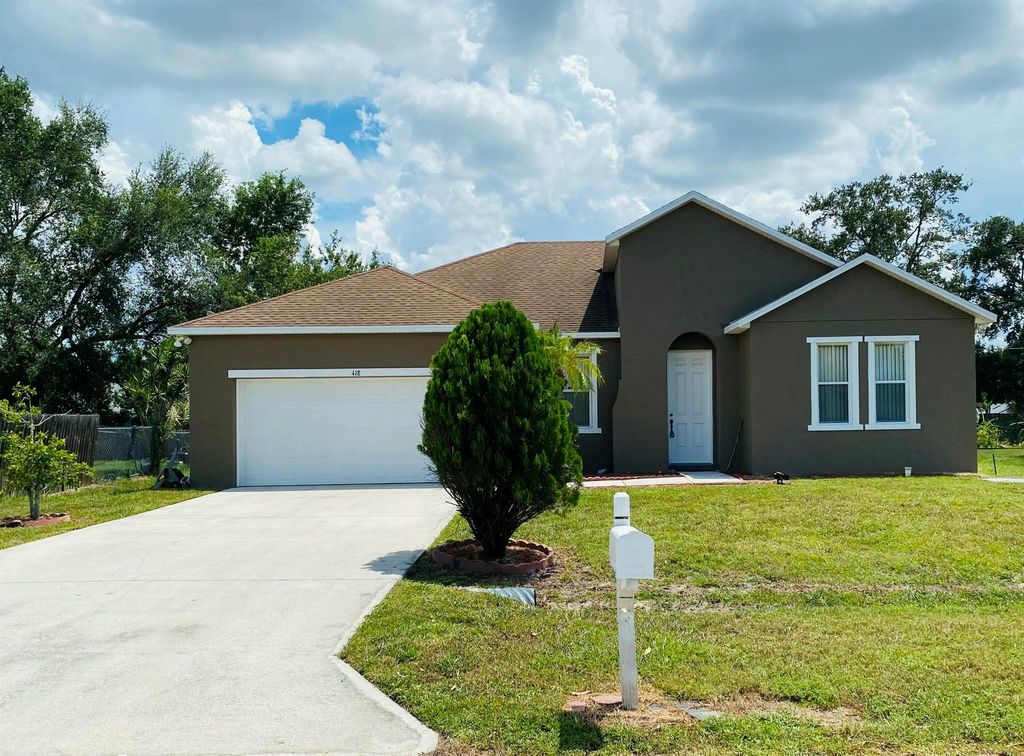 Photo of 418 SE Guava Terrace, Port Saint Lucie, FL 34983 (MLS # R11117445)