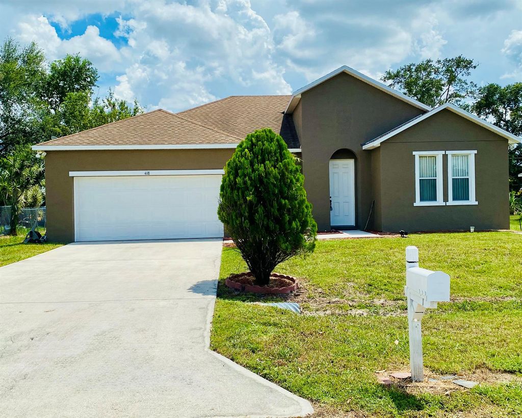 Photo of 418 SE Guava Terrace, Port Saint Lucie, FL 34983 (MLS # R11117445)