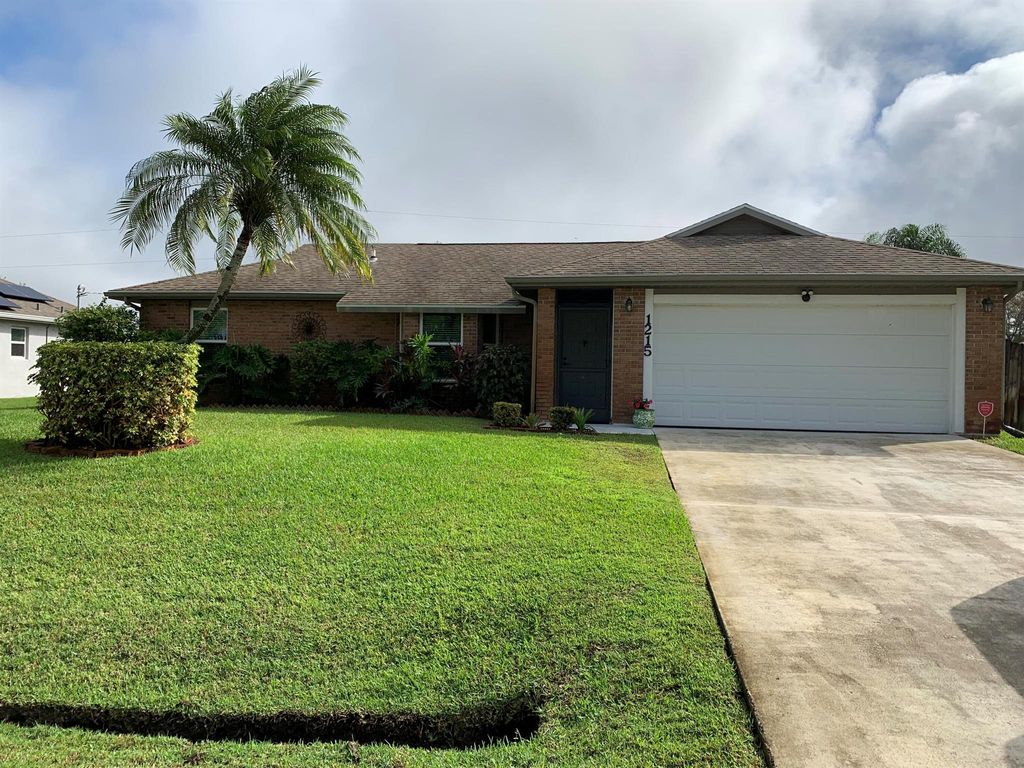 Photo of 1215 SW Cynthia Street, Port St Lucie, FL 34983 (MLS # R10939766)