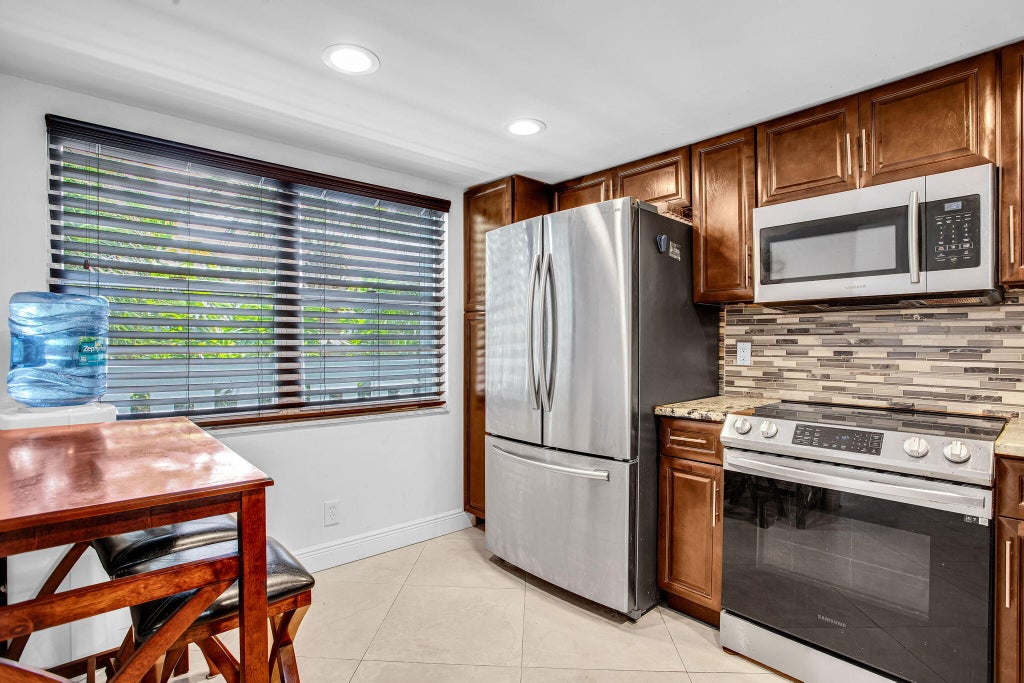 Photo of 2804 VICTORIA Way #C3, Coconut Creek, FL 33066 (MLS # B26092771)