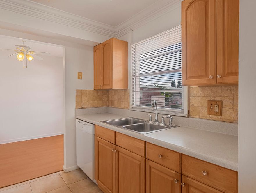 ACTIVE 55+ COMMUNITY -  Large two bedroom/two bath with a semi private pool. Central a/c and galley kitchen.  Gated community with 24/7 manned, gated security at both entrances! Condo features tile and laminate flooring. Residents enjoy resort-style amenities including a luxurious clubhouse, state of the art theatre, a health and fitness center with a resistance pool, tennis courts, scenic biking paths, boating, courtesy transportation, and more.  It is perfect for year-round or seasonal living. 2- year hold to lease for a new buyer. IN UNIT WASHER/DRYER ALLOWED BUT THERE IS NO HOOKUP. Roof replaced in 2024.