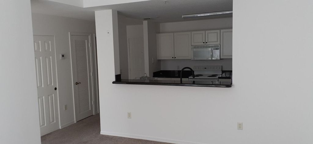 Photo of 1203 Town Center Drive #310, Jupiter, FL 33458 (MLS # R11155742)