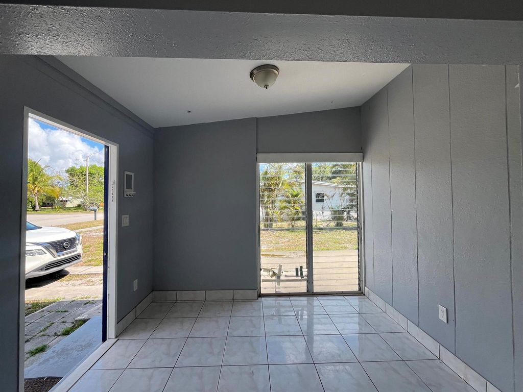 Photo of 345 SE Abeto Lane, Port Saint Lucie, FL 34983 (MLS # R10984888)